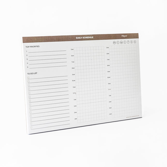 Side view of 24-Hour planner pad showing hourly layout for daily schedule