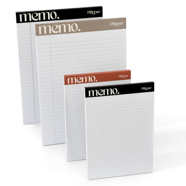 Full collection of premium notepads in two sizes and four colors: large in black and taupe, medium in black and burnt orange